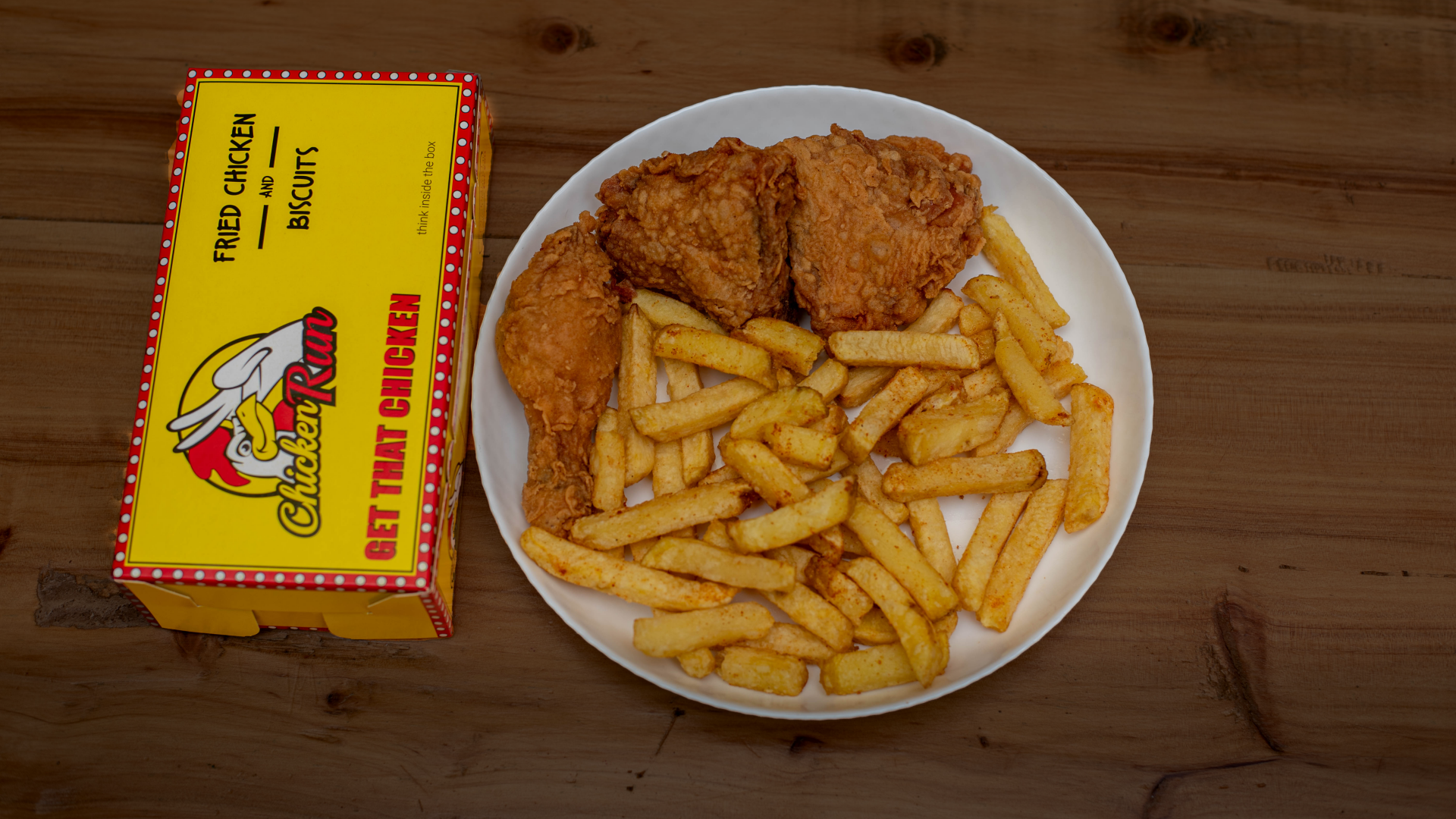 ChickenRun menu spread of buckets, combos, and loaded chips